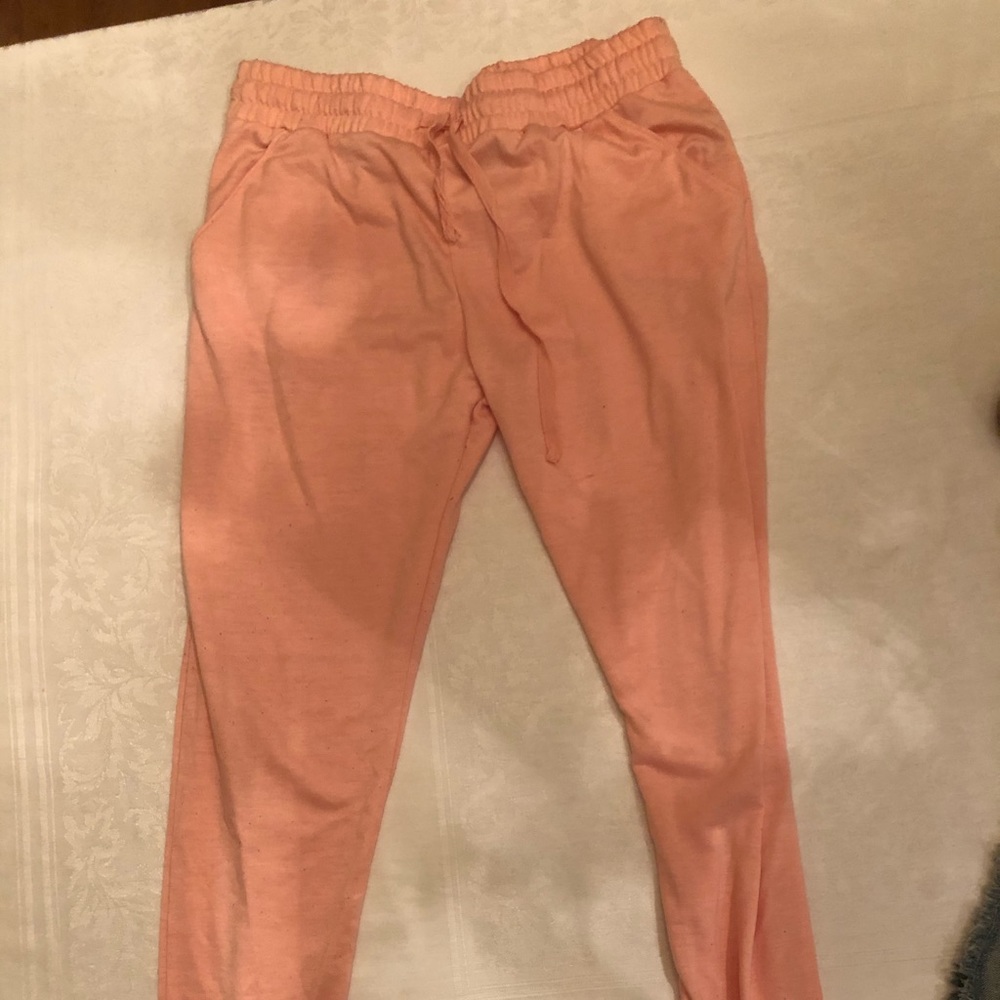 Baggy pink sweatpants.